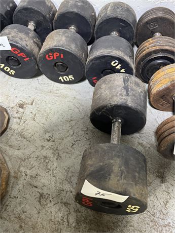 Lot 75 - Dumbbells (1) 125 lbs, (1) 100 lbs