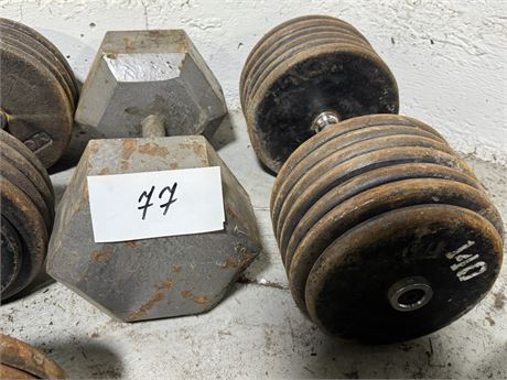 Lot 77 - Dumbbells (1) 140 lbs, (1) 105 lbs