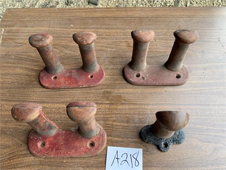 Lot 218 - (4) Cast Iron Wall Mounts