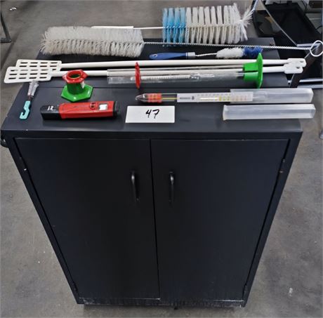 Lot 47 - Black Rolling Cupboard with Brew Testing and Cleaning Items